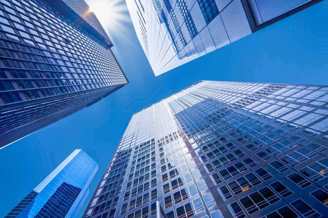 Looking up at business buildings in downtown New York, USA