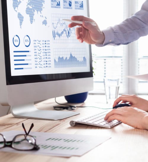 Two people analyzing stock market investment strategy with key performance indicator on financial dashboard and business intelligence on computer